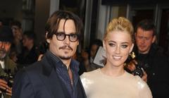 johnny depp dating amber heard again? spotted at stones concert